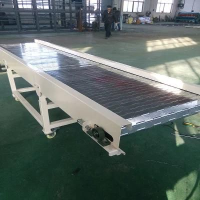 Motorized Belt Driven Flexible Roller Conveyor for Truck Loading and Offloading