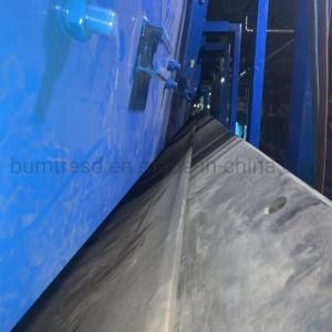 Conveyor Belt Protection with Hooded Discharge Chute