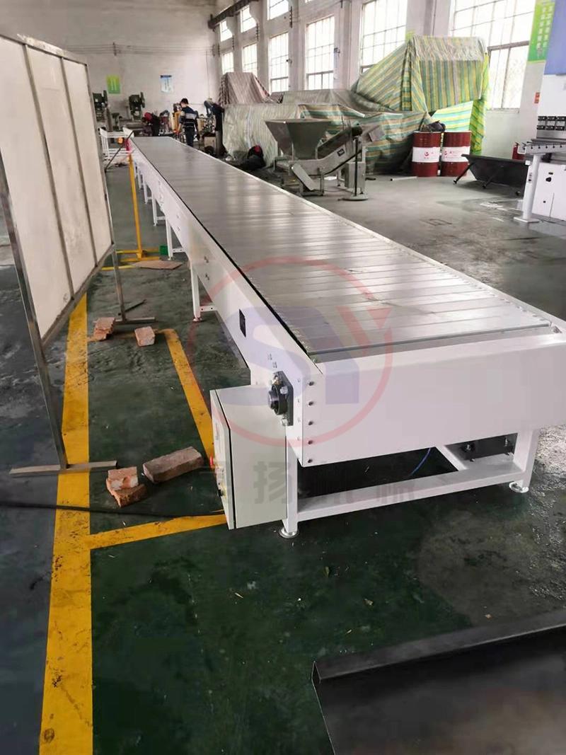 Electric Motor Driven Lifting Chain Plate Conveyor with Best Price