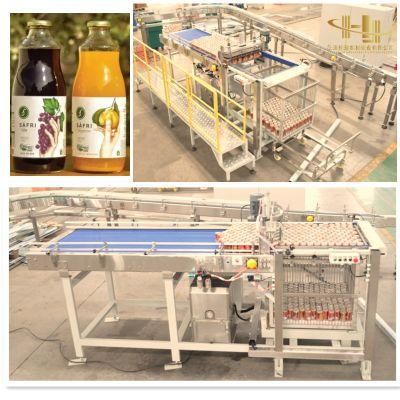 Filled Bottles Products Enter The Cage Machine From The Conveyor Line